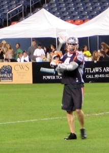 Denver Outlaw Throwing a Pass